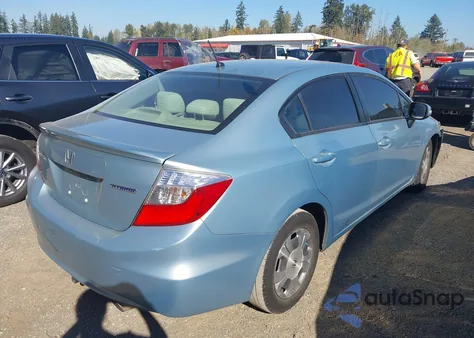 2012 Honda Civic Hybrid z USA, uszkodzony, nr VIN JHMFB4F21CS008409